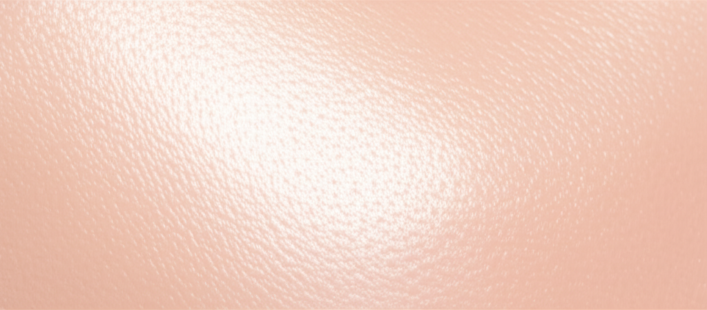 A close-up of healthy, glowing skin reflecting light, with subtle, almost imperceptible, hints of previous sun damage that are now significantly faded.